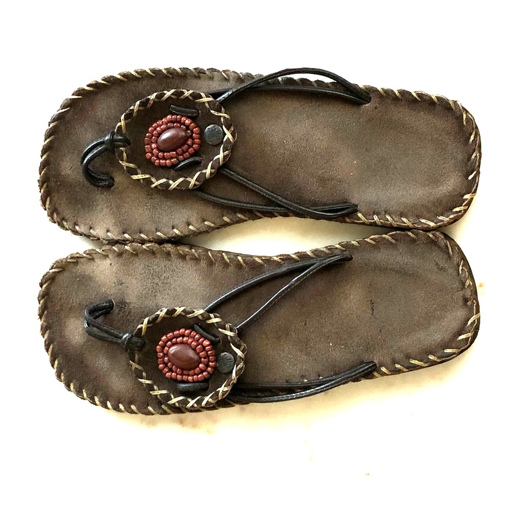 Brown leather flip flop sandals